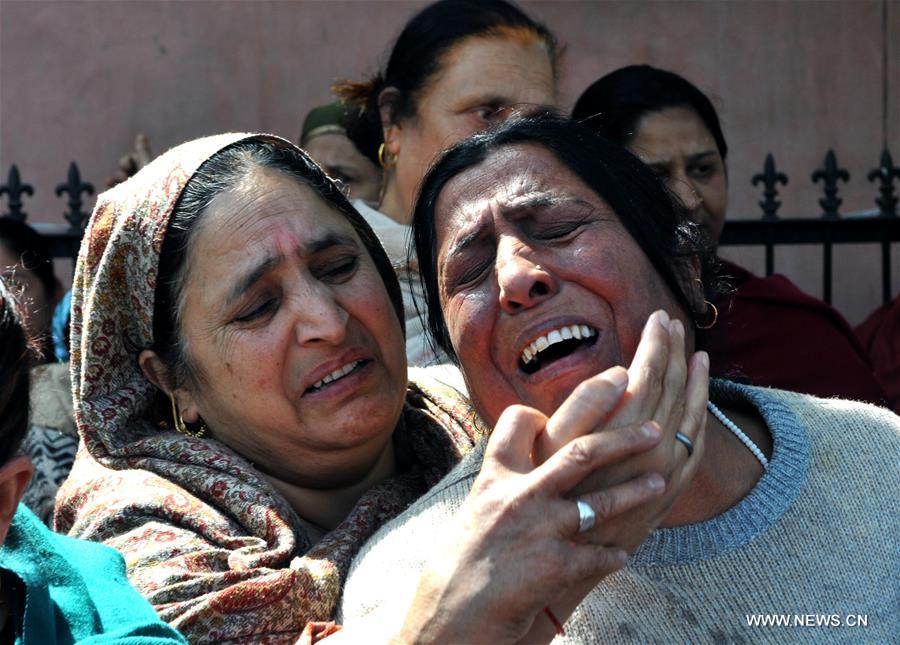 INDIAN-CONTROLLED KASHMIR-JAMMU-POLICE GUARD-FUNERAL