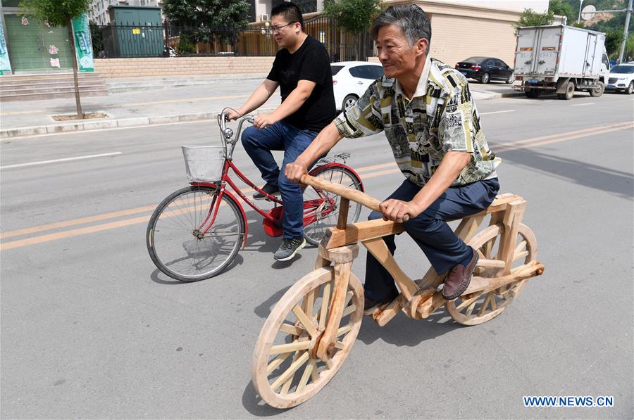 CHINA-GANSU-PINGLIANG-WOODEN BICYCLE (CN)