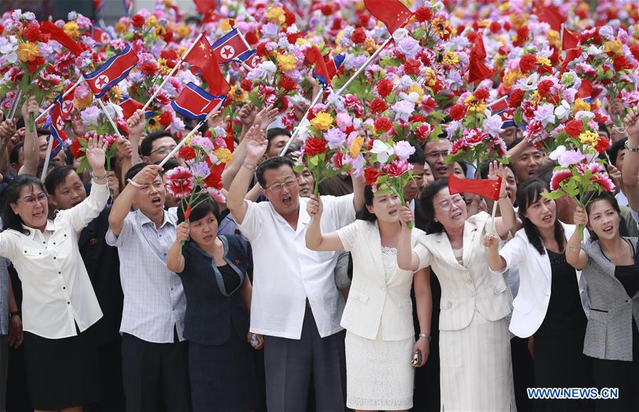 DPRK-PYONGYANG-XI JINPING-PEOPLE-WELCOME