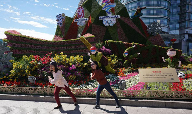 Beijing decorated with ornamental flower parterres for upcoming National Day