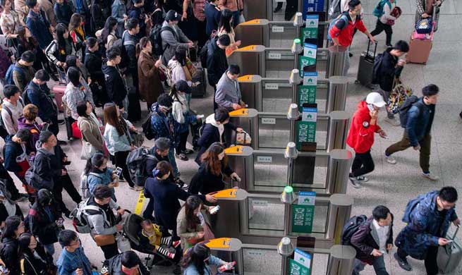 In pics: May Day holiday travel rush in China's Jiangsu