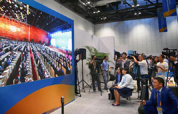 Reporters gather to watch opening cermeony of Belt and Road forum